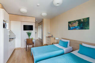 Гостевой дом Гранд Каньон Санкт-Петербург СТУДИЯ СТАНДАРТ С ДВУМЯ ОДНОСПАЛЬНЫМИ КРОВАТЯМИ-2