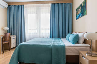 Гостевой дом Гранд Каньон Санкт-Петербург СТУДИЯ СТАНДАРТ С ОДНОЙ ДВУСПАЛЬНОЙ КРОВАТЬЮ-1